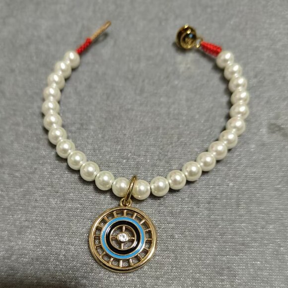 Roxanne Assoulin The Protect Pearl Bracelet | Shopbop Roxanne Assoulin Pearl and Protect Charm Bracelet